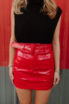 FAUX LEATHER BELTED SKIRT IN RED